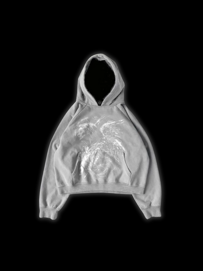 Close up front view of the LuxCrux™ Archangel Base Hoodie on a black background of the gray variant.