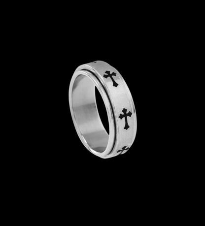 Close up view of the LuxCrux™ Cross Rotatable Ring on a black background.