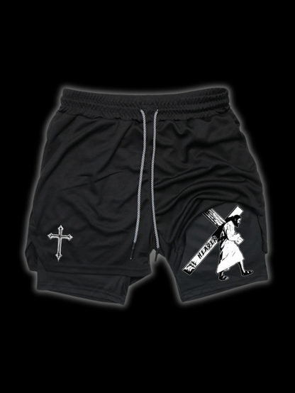 Close up front view of LuxCrux Jesus Shorts, Black/Black variant on a black background